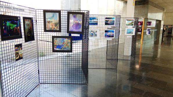 The photographs are displayed in the TAS corridor.